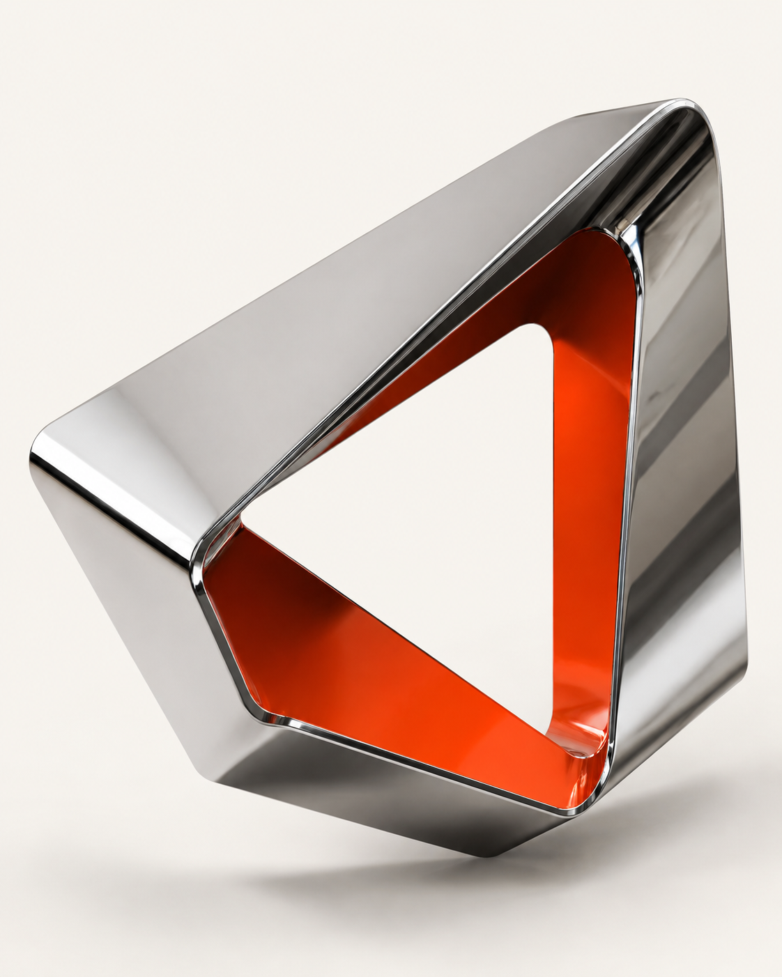 A folded chrome sculpture with a vermilion interior and sharply finished edges